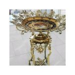 میوه خوری برنزی کنار سالنی